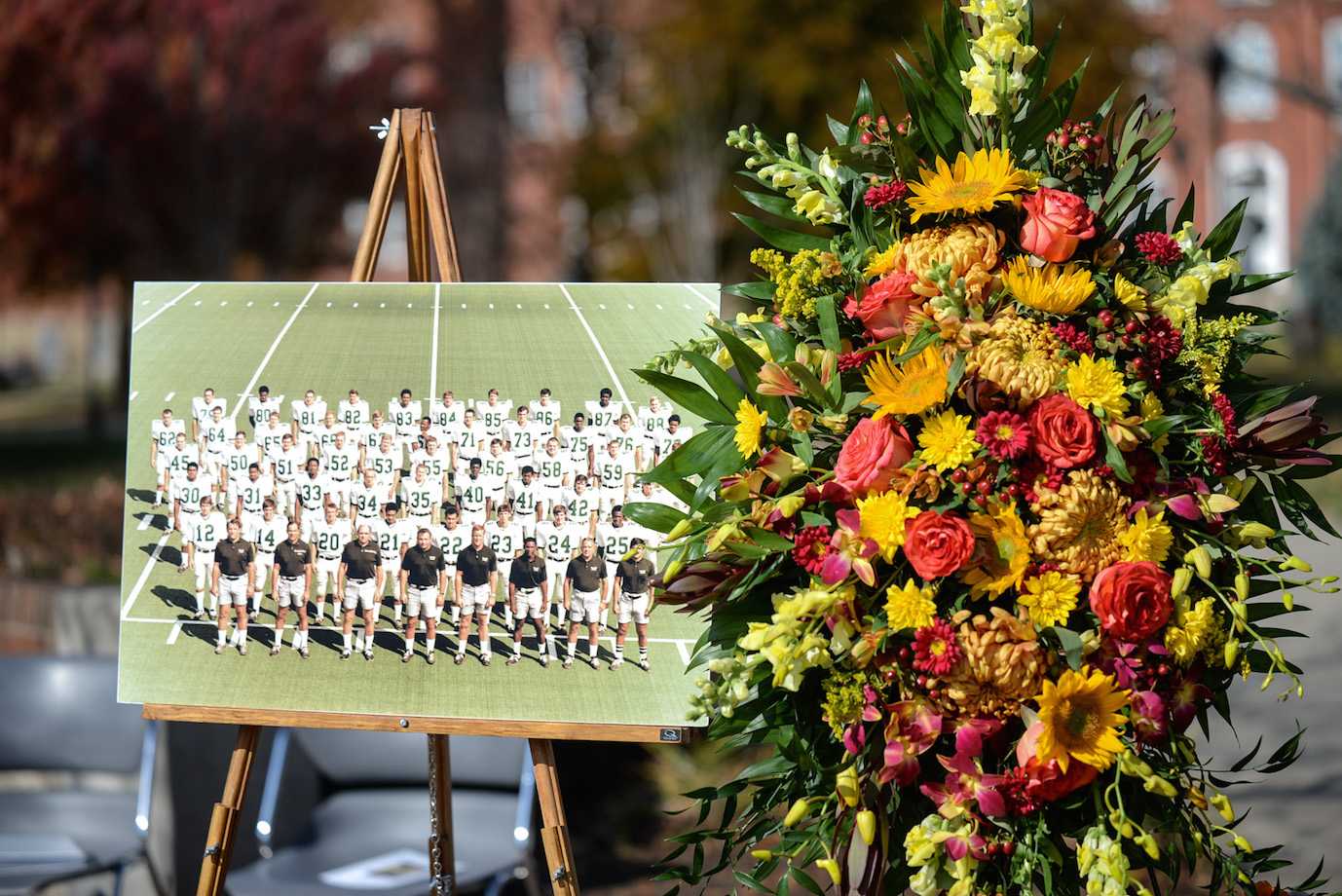 A photo of the 1970 Marshall football team is displayed during the 44th annual memorial service Friday at the Memorial Student Center plaza.