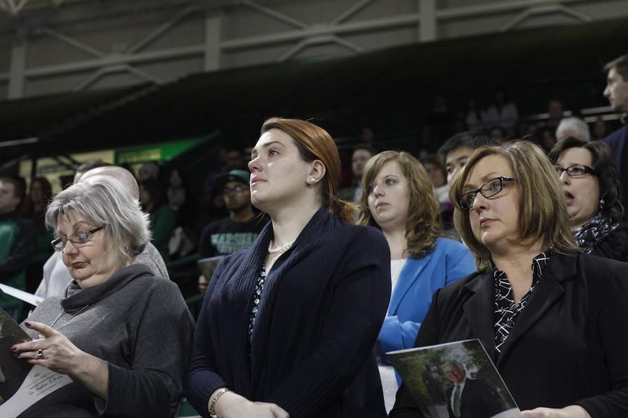 Students, faculty and members of the community pay tribute to  Stephen J. Kopp Tuesday in the Cam Henderson Center. 