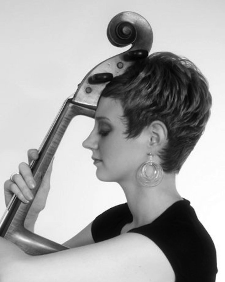 Woman+with+cello+arm+resting+on+her+forehead