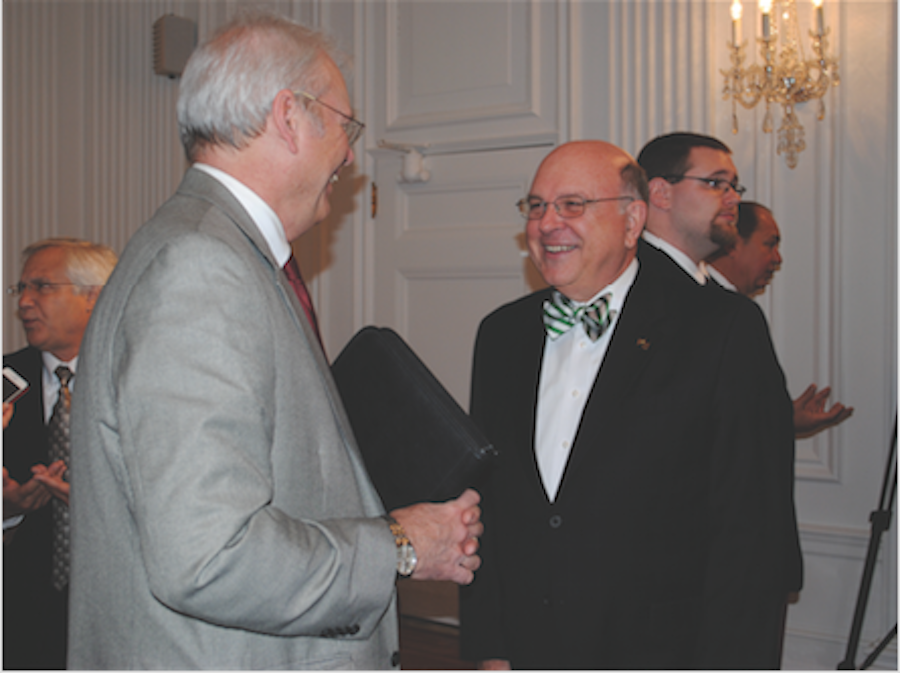 Interim President Gary White (right) and Vice Chancellor for Academic Affairs, Corley Dennison (left), talk during West Virginia Higher Education Day Tuesday in Charleston. 