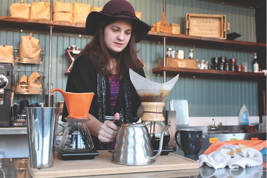 Madelynn Coalson, barista at Bittersweet Coffeehouse, brews a cup of coffee using the house’s pour over method. 
