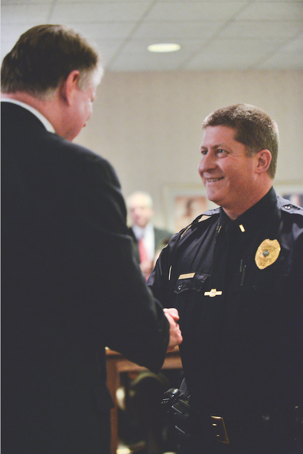 Lieutenant Officer John Williams receives the honor of Huntington Police Department’s Officer of the Year Monday at City Council.