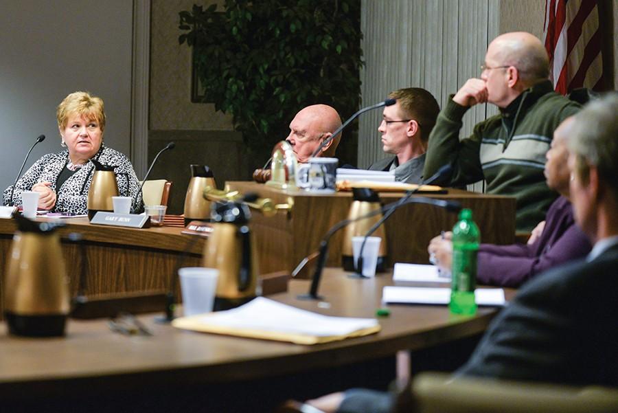 Members of Huntington’s City Council discuss current issues faced by the city during the City Council  meeting Monday.