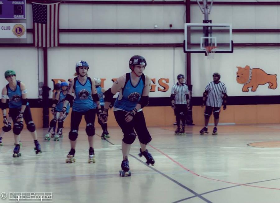 V Bomb (left), Country Breakfast (middle) and Altered E. Co of Jewel City Rollergirls skate in a bout against Greenbrier  Roller Vixens April 26, 2014. 
