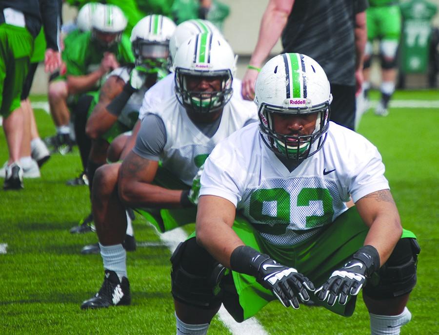 The 2015 Marshall University football team starts drills during its first spring practice Tuesday at the Joan C. Edwards Stadium.