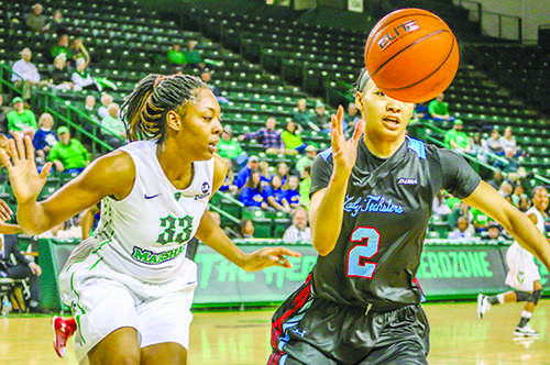 Chukwuka Ezeigbo goes for the ball against Louisiana Tech University Jan. 31 at the Cam Henderson Center