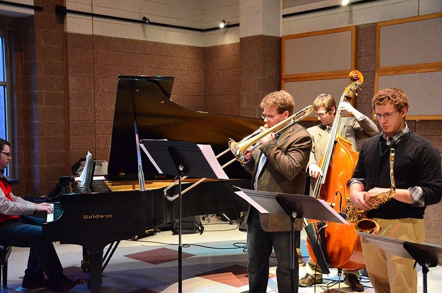 Trombonist Jason Miller, left, performs Wednesday at the Jomie Jazz Center to close out the Guest Artist Series.