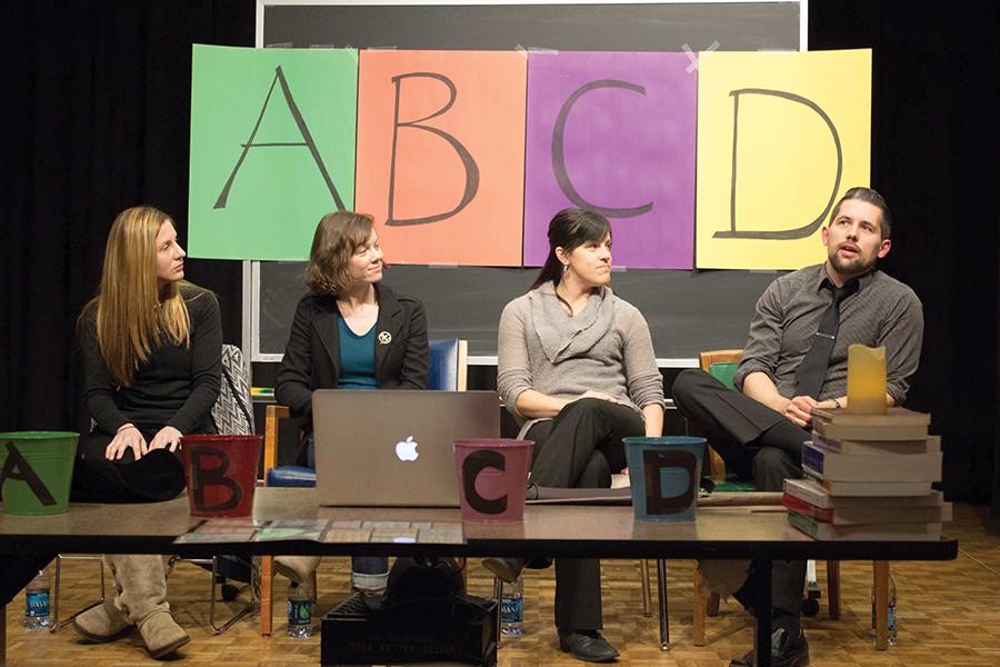 Professors Dawn Howerton, left, Hillary Brewster, Robin Conley and Shawn Schulenberg participate in Wizards of Sexuality, an informational Q&A game show Monday in Smith Hall.      