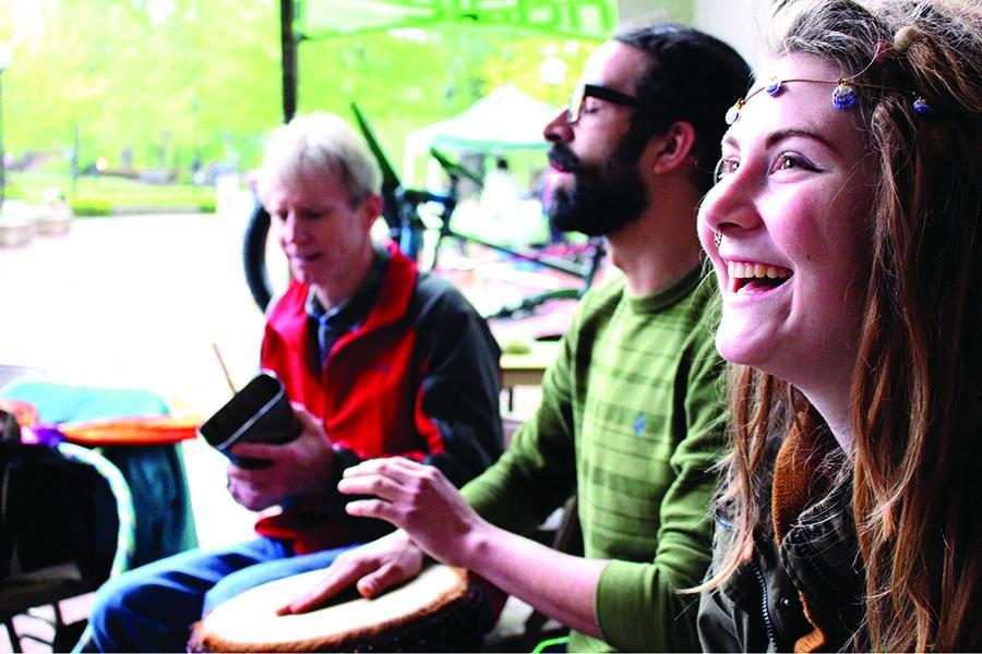 The Unitarian Fellowship of Huntington Drum Circle jams outside the Memorial Student Center in celebration of Earth Day on campus Wednesday. 