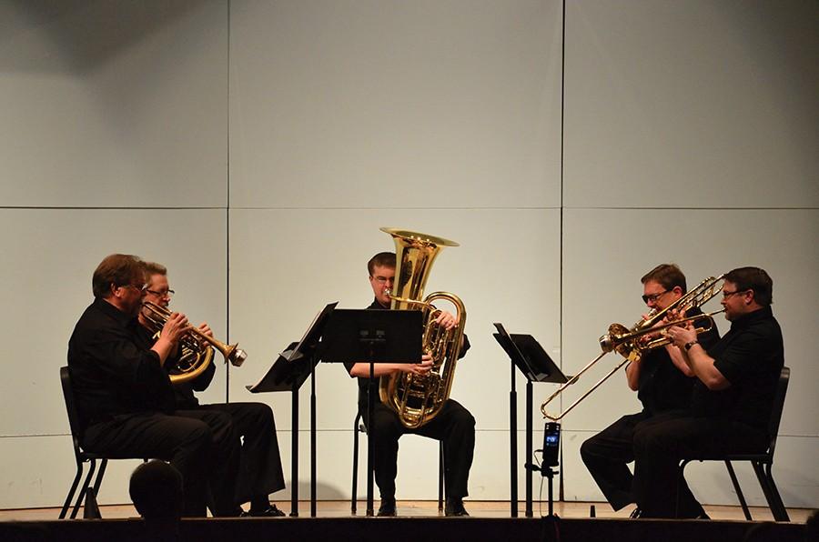 Marshall faculty perform as a quintet Wednesday in Smith Recital Hall. Performers include Steven Trinkle (trumpet), left, Stephen Lawson (French horn), George Palton (tuba), Michael Stroeher (trombone) and  Martin Saunders (trumpet).  