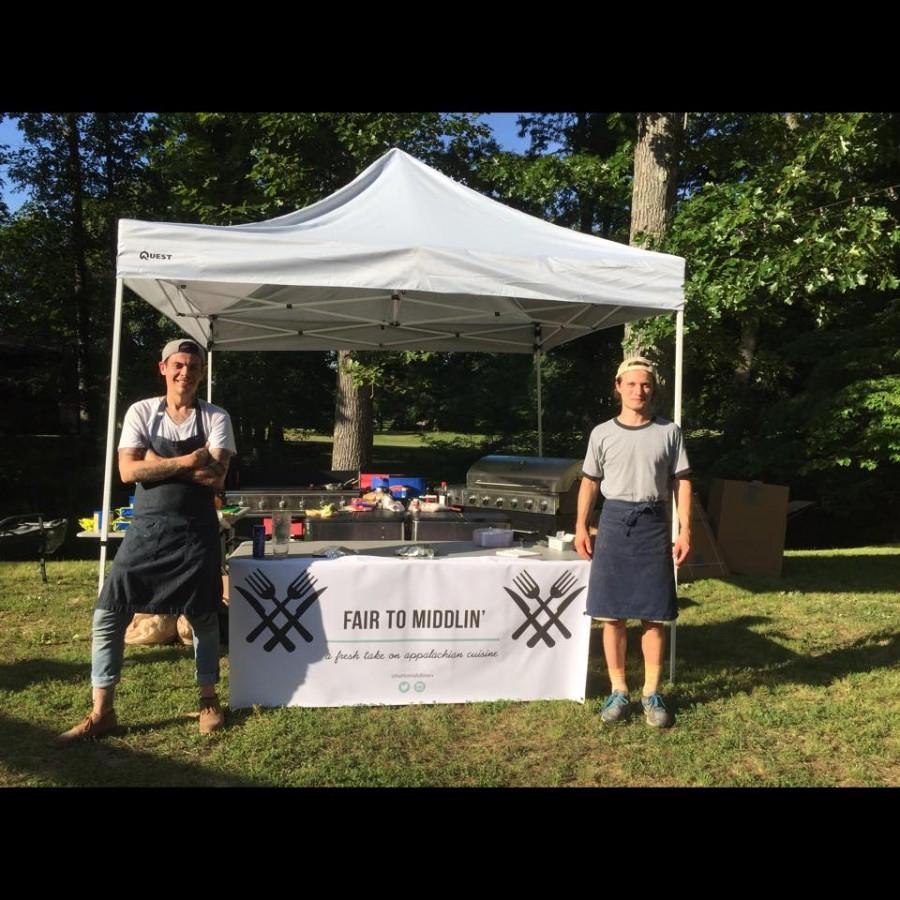 Owner Nicholas Taylor
(left) stands beside his
mobile kitchen at a recent
engagement party the
business catered.