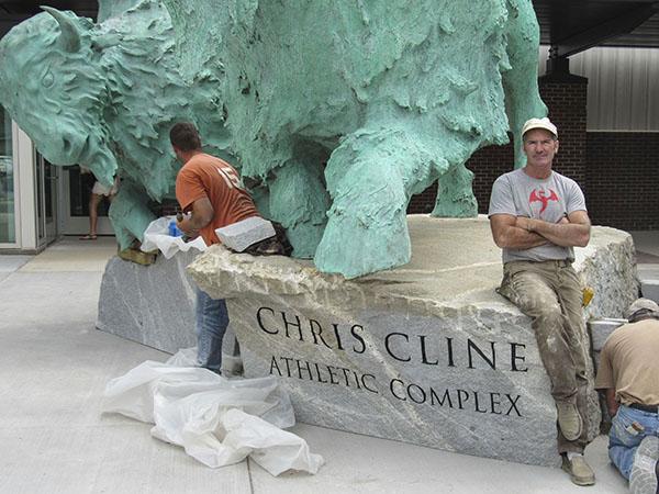 Stan Mullins with bison statue