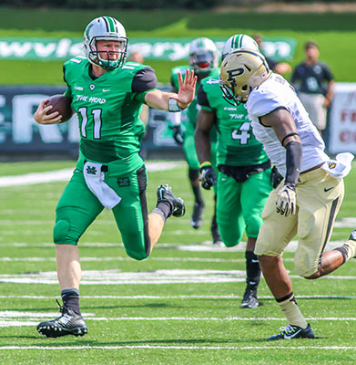 Michael Birdsong runs the ball in opening game against Purdue.