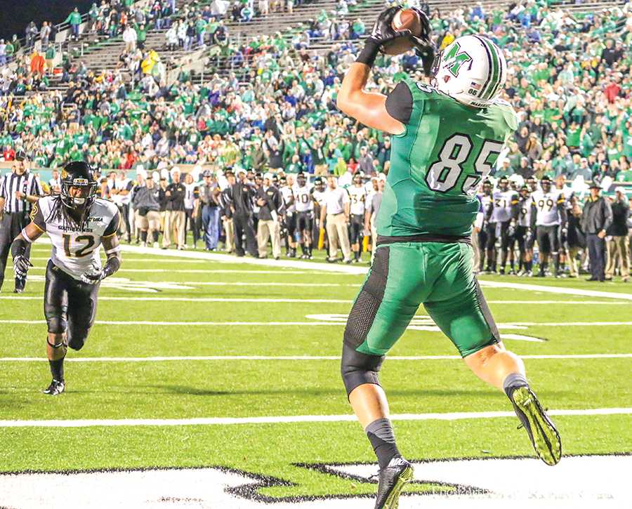 Marshall University sophomore tight end Ryan Yurachek catches a touchdown pass during its game against the University of Southern Mississippi Oct. 9.