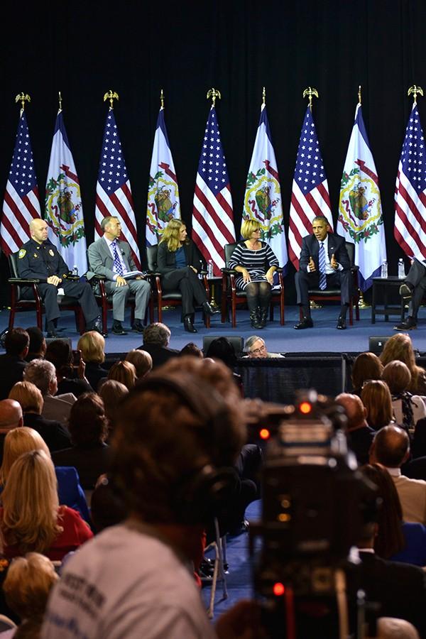 After his speech, President Obama participated in a roundtable discussion with (from left to right) Brent Webster, Charleston Chief of Police, Dr. Michael Brumage, Sylvia Burwell, U.S. Secretary of Health and Human Services, Executive Director of the Kanawha-Charleston Health Department, Carrie Dickson, Mother of a recovering addict.