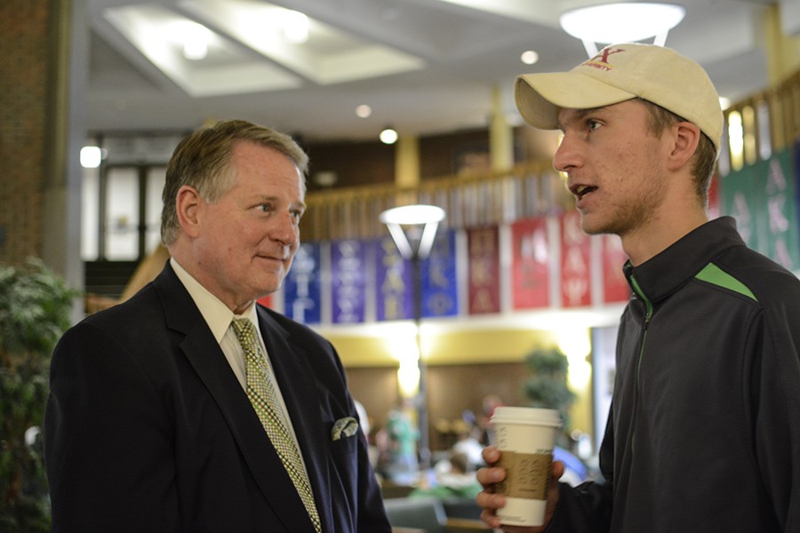 Huntington Mayor Steve Williams (left) speaks to a student at the last Coffee with the Mayor. This is an opportunity to allow students to speak with the mayor in an informal setting.