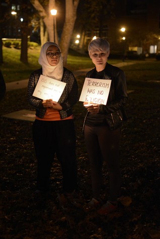 Deena Dahshan, Freshman Biology major and Megan McCray, Freshman Sociology Major at the Candlelit Vigil Tuesday night.