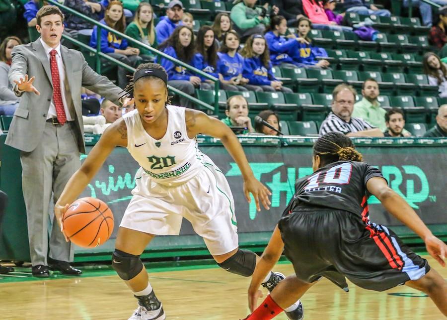 Marshall point guard Norrisha Victrum dribbles the ball in a game last season.