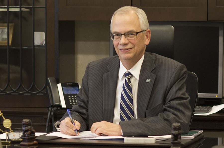Marshall University President Jerry Gilbert poses for a photograph inside his office on Monday, Jan. 25.