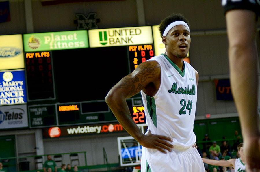 Marshall University senior forward James Kelly waits for the ball at the free-throw line during a game earlier this season at the Cam Henderson Center.