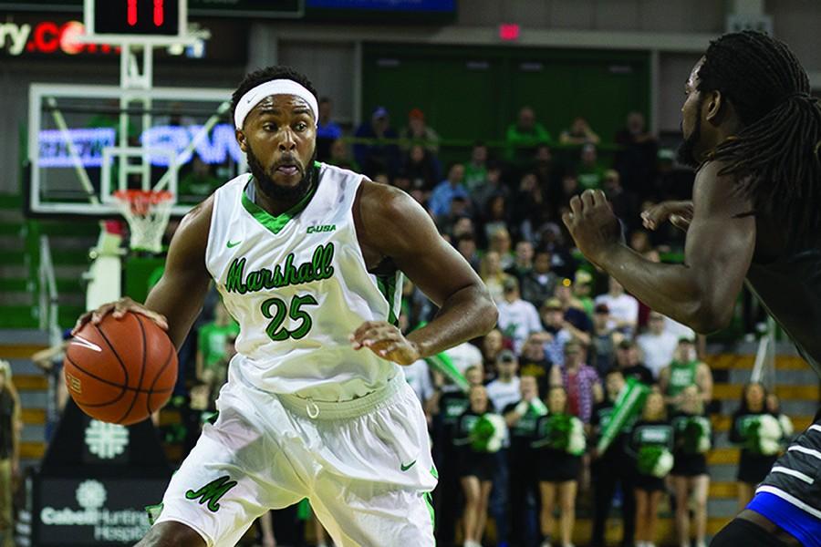 Marshall University junior forward Ryan Taylor makes a move to the basket during a game earlier this season at the Cam Henderson Center.