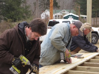 Habitat for Humanity associates work on constructing affordable housing for low income families on Monday.