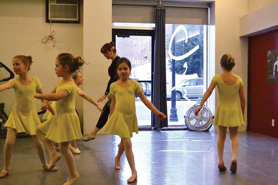 Children participate in a program taught as part of the JPAC program at 4th Ave Arts, February 8, 2016.