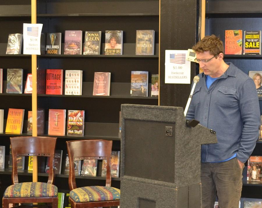 Joel Peckham reads a piece from his forthcoming book, Body Memories, during Writers Can Read Night at Empire Books and News.