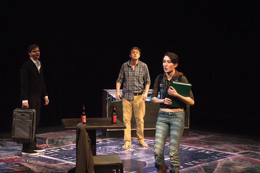 Jackie, portrayed by Story Moosa, argues with Sterling (right), played by Ethan Lyvers, and Dennis (left), played by Remy Sylvain, during the dress rehearsal for Mauritius on February 15, 2016.