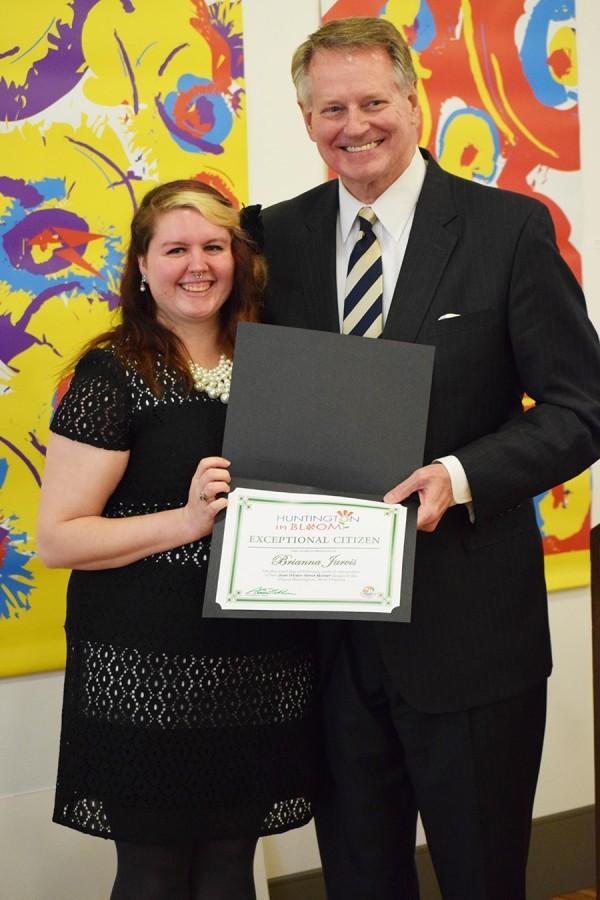 Mayor Steve Williams presented the Huntington in Bloom Winter Banner contest certificate to winner, Brianna Jarvis Feb. 23 at the Visual Arts Center.