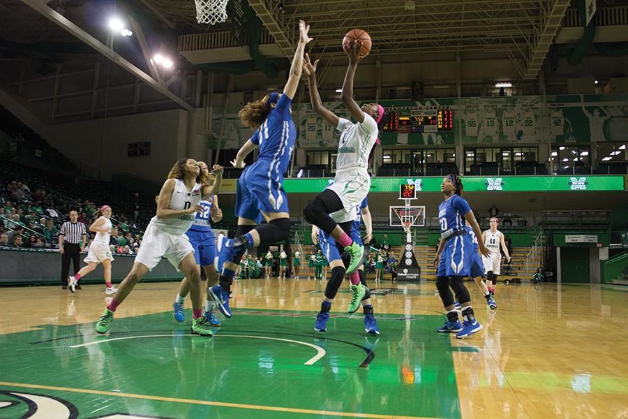 Marshall University senior Leah Scott goes for a shot Saturday against Middle Tennessee State University.