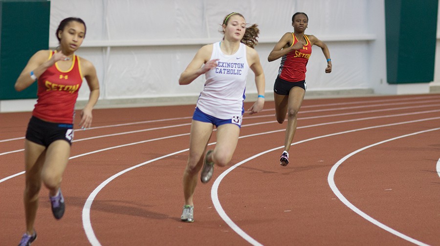 Runners from Lexington Catholic and Seton High Schools compete Saturday at the Chris Cline Indoor Athletics Facility.