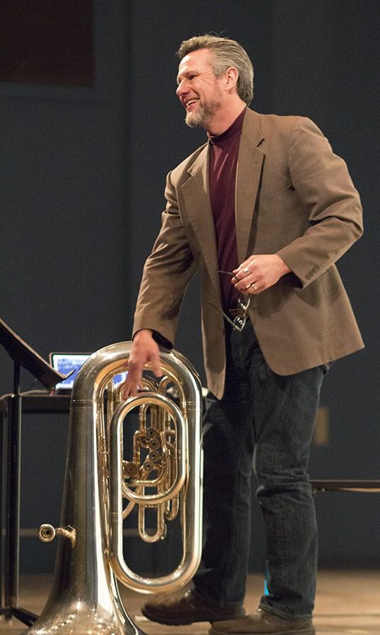 Tony Zilincik takes a bow after performing the tuba solo Fanfar(e) in Smith Recital Hall, March 2, 2016.