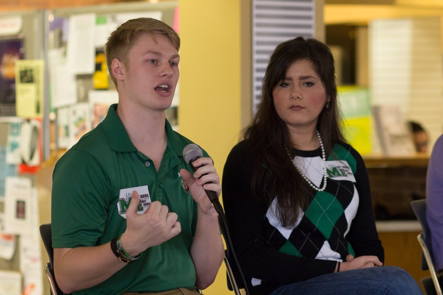 Matt Jarvis and Emily Kinner respond to the audience at the SGA debate in the Memorial Student Center, March 14, 2016.