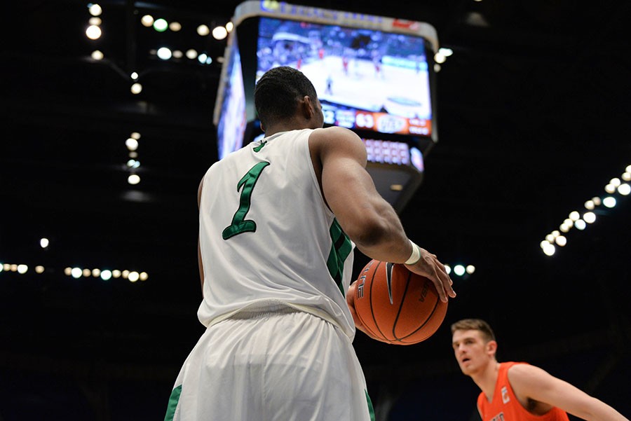 Lexi Browning/The Parthenon
Marshalls Terrence Thompson passes from the edge of the court as the Herd takes on UTEP during the C-USA men’s basketball quarter finals on Thursday, March 10 in Birmingham, AL.