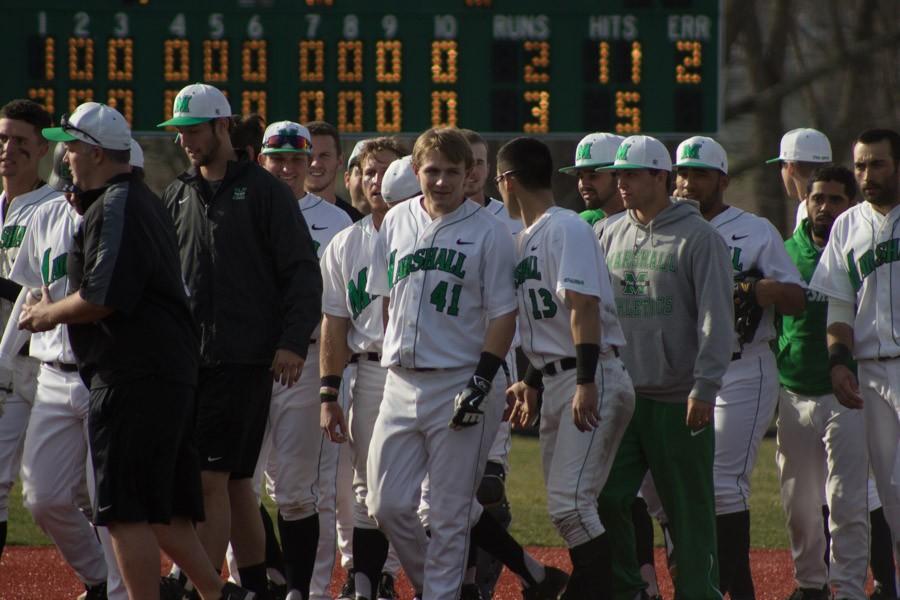 Marshall University’s baseball team takes the field after a game earleir this season at the Kennedy Center Field.