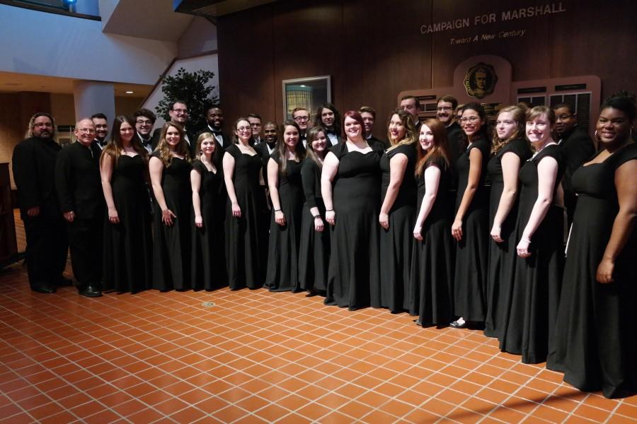 Marshall Universitys Chamber Choir is photographed in the Joan C. Edwards Playhouse lobby after a performance.