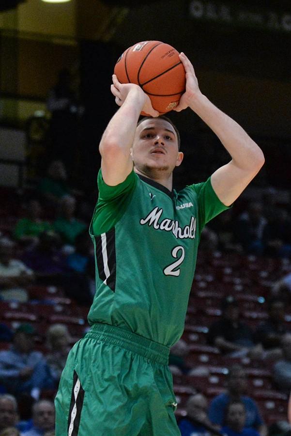 Marshall guard Stevie Browing (2) shoots a three-point shot as the Herd takes on Middle Tennessee in last seasons C-USA Men’s Basketball Semifinals in Birmingham, AL.