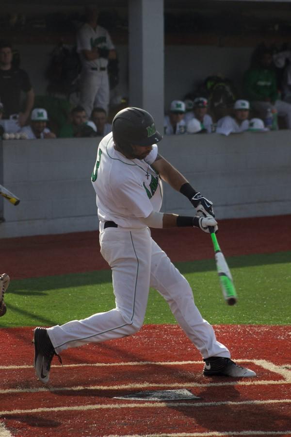 Marshall second baseman DJ Gee swings at a pitch in a game earlier this season.