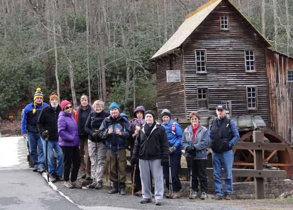 Members of the West Virginia Sierra Club assemble in front of a grist mill on a weekend outing.