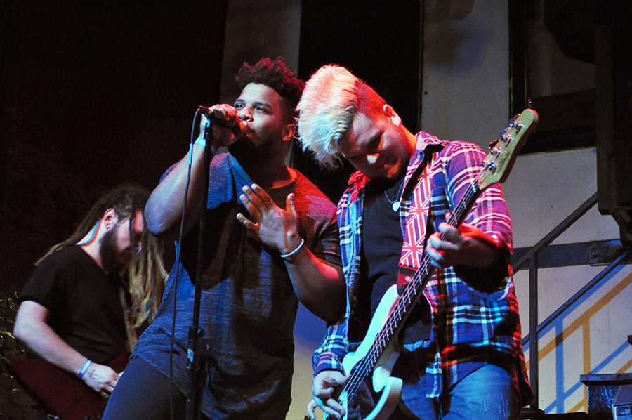 From left to right: Chamberlain Foreman on guitar, Scott Smith on vocals, and Luke Cresey on bass, playing for their band Torn in Two at the Battle of the Bands 10 p.m. Saturday at Ale House.