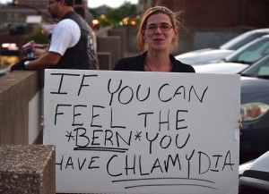 Kayla Hammond holds a sign voicing her support for Republican candidate Donald Trump in protest of the Bernie Sanders rally at the Big Sandy Superstore Arena, April 26, 2016.