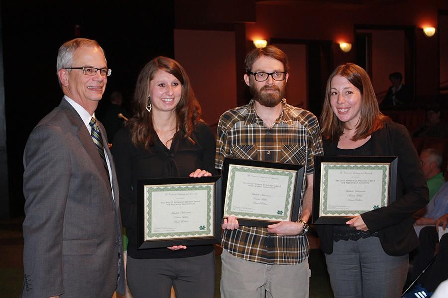 President Gilbert stands with this years recipients of the Hedrick Program Grant for Teaching Innovation: (from left to right) English instructor Anna Rollins, assistant professor of geology Mitchell Scharman and assistant professor of English Kristen Lillvis.