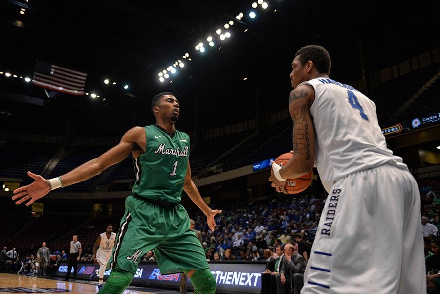 Marshall University sophomore Terrence Thompson defends an inbound pass March 11 against Middle Tennessee State University in the Conference USA semifinals.