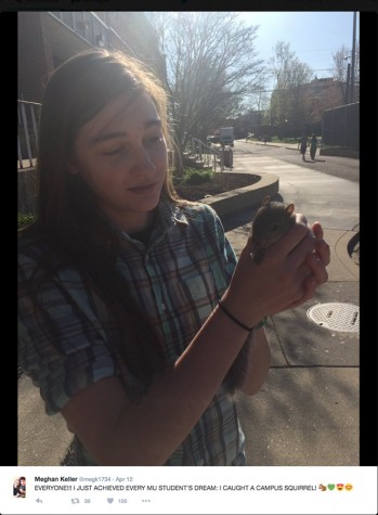 Marshall University freshman, Megan Keller holding Petunia the squirrel.