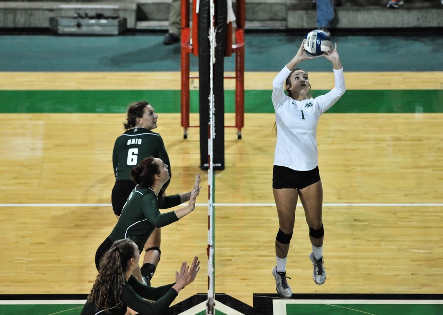 Junior setter Kayla Simmons reaches the ball during the match versus Ohio in the Cam Henderson center, August 30, 2016.