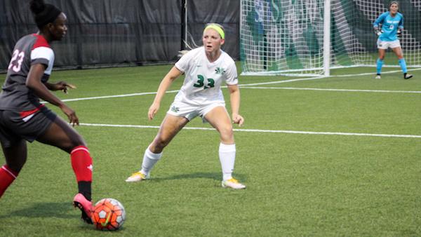 Marshall University junior McKenna Klodnick defends against an attempted shot from Western Kentuck University at the Hoops Family Field, September 15, 2016.