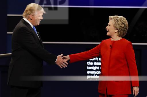 Republican presidential nominee Donald Trump and Democratic presidential nominee Hillary Clinton shake hands during the presidential debate at Hofstra University in Hempstead, N.Y., Monday, Sept. 26, 2016. (AP Photo/David Goldman)