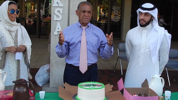 Maurice Cooley cuts the cake to begin the celebration of Saudi Arabian National Day Monday on Marshall University’s campus.