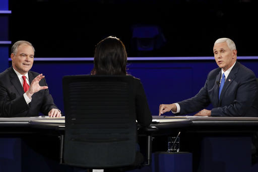 Democratic vice-presidential nominee Sen. Tim Kaine, left, and Republican vice-presidential nominee Gov. Mike Pence answers a question during the vice-presidential debate at Longwood University in Farmville, Va., Tuesday, Oct. 4, 2016. (AP Photo/David Goldman)